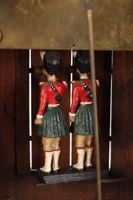 Lot 156 - A MID 19TH CENTURY BLACK FOREST WALNUT TRUMPETER CLOCK