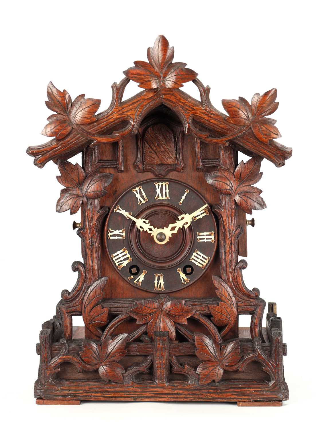 Lot 4 - A LATE 19TH CENTURY BLACK FOREST CARVED WOOD CUCKOO CLOCK