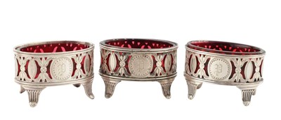 Lot A SET OF THREE LATE 19TH CENTURY SILVER TABLE SALTS