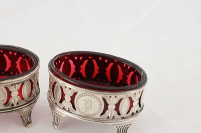 Lot A SET OF THREE LATE 19TH CENTURY SILVER TABLE SALTS