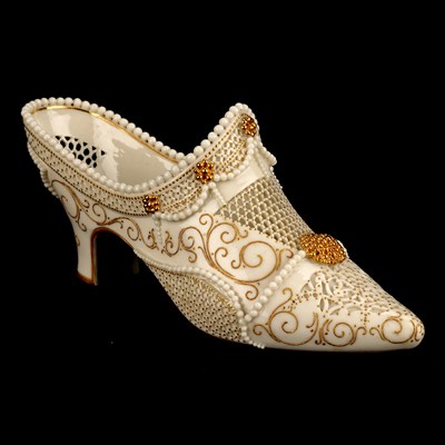 Lot AN EARLY 20TH CENTURY ROYAL WORCESTER RETICULATED MODEL OF A SHOE BY GEORGE OWEN
