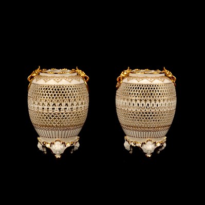 Lot A FINE PAIR OF EARLY 20TH CENTURY ROYAL WORCESTER RETICULATED VASES BY GEORGE OWEN