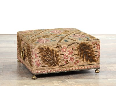 Lot AN EARLY 19TH CENTURY NEEDLEWORK FOOTSTOOL