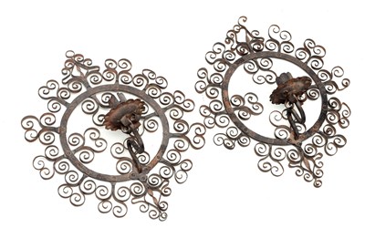 Lot A PAIR OF WROUGHT IRON WALL SCONCES