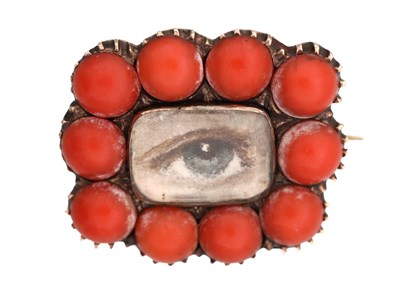 Lot A VICTORIAN 9CT GOLD MOURNING BROOCH WITH CABOCHON CORAL DECORATION
