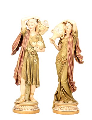 Lot A PAIR OF EARLY 20TH CENTURY ROYAL DUX FIGURES