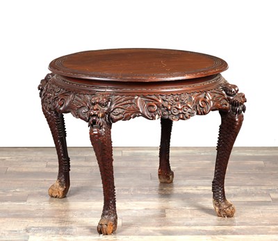 Lot A 19TH CENTURY CHINESE CARVED ELM CIRCULAR TABLE