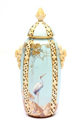 Lot WALTER POWELL AN UNUSUAL EARLY 20TH CENTURY ROYAL WORCESTER RETICULATED AND HAND PAINTED CABINET VASE