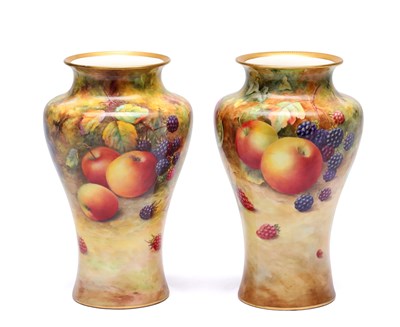 Lot A PAIR OF EARLY 20TH CENTURY ROYAL WORCESTER HAND PAINTED FRUIT CABINET VASES BY T. LOCKYER