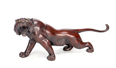 Lot A JAPANESE MEIJI PERIOD PATINATED BRONZE SCULPTURE OF A TIGER