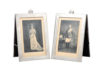 Lot A FINE PAIR OF EARLY 20TH CENTURY SILVER FRAMED SIGNED ROYAL PHOTOGRAPHS OF KING GEORGE V AND QUEEN MARY