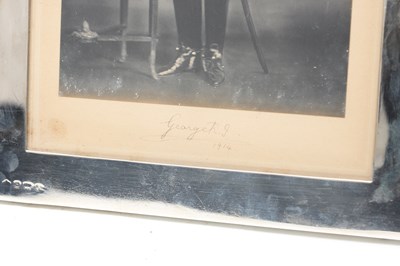 Lot A FINE PAIR OF EARLY 20TH CENTURY SILVER FRAMED SIGNED ROYAL PHOTOGRAPHS OF KING GEORGE V AND QUEEN MARY