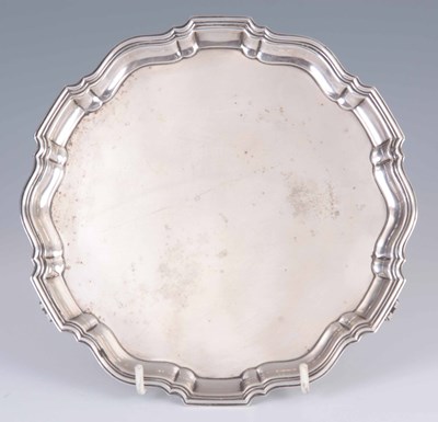 Lot 245 - A 1930's SILVER CARD TRAY with moulded raised...