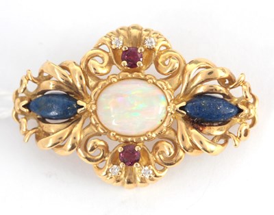 Lot 251 - AN 18K YELLOW GOLD BROOCH set with oval opal...