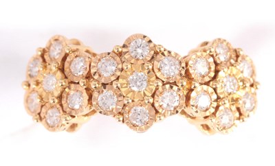 Lot 263 - AN 18K YELLOW GOLD DIAMOND CLUSTER formed as...