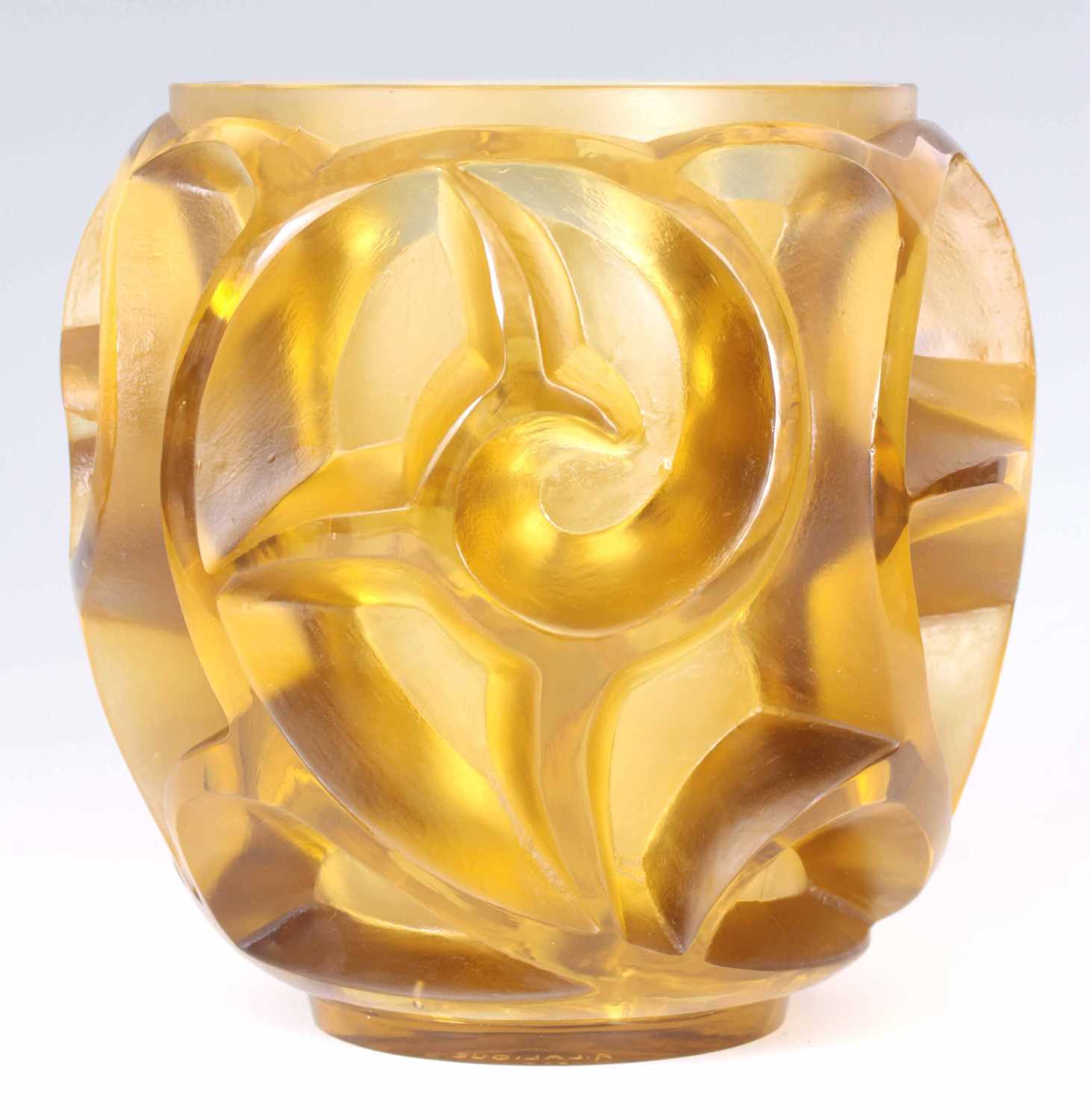 Lot 27 - RENÉ LALIQUE. A RARE 'TOURBILLONS' AMBER GLASS...