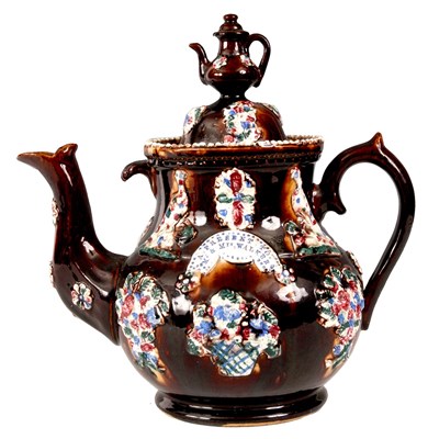Lot 31 - A LATE 19TH CENTURY MEASHAM WARE GIANT TEAPOT...