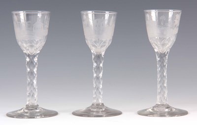 Lot 2 - A SET OF THREE GEORGIAN ENGLISH WINE GLASSES...