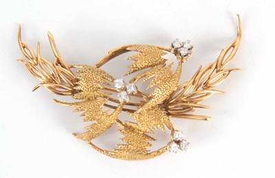 Lot 167 - A GOLD AND DIAMOND BROOCH having six brilliant...