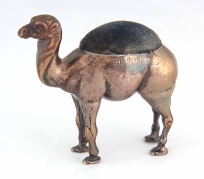 Lot 142 - AN EDWARDIAN NOVELTY SILVER PIN CUSHION formed...
