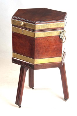 Lot 1000 - AN 18TH CENTURY FIGURED MAHOGANY BRASS BOUND...