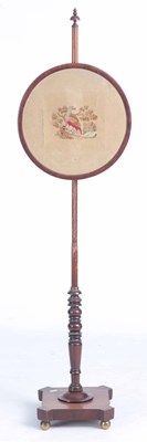 Lot 1011 - A MID 19th CENTURY MAHOGANY POLE SCREEN on...