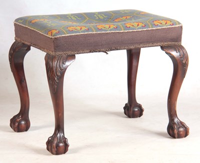 Lot 1019 - A 19TH CENTURY MAHOGANY STOOL with leaf carved...