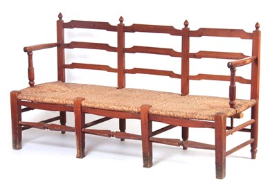Lot 1027 - A PITCH PINE ARTS AND CRAFTS STYLE RUSH SEATED...