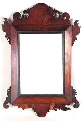 Lot 1034 - A GEORGE III FLAMED MAHOGANY HANGING MIRROR...