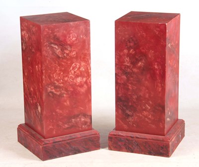 Lot 1041 - A PAIR OF 20TH CENTURY FAUX MARBLE PEDASTELS...