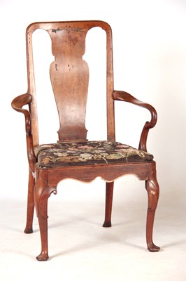 Lot 1050 - AN EARLY GEORGE I WALNUT ARMCHAIR with a...