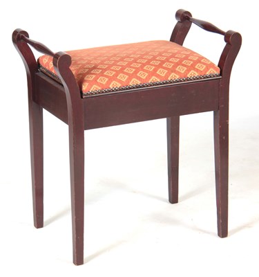 Lot 1082 - A PIANO STOOL with lift up seat
