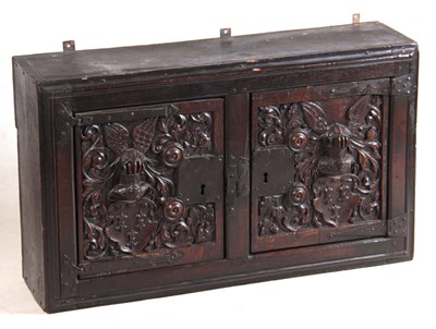 Lot 1121 - AN EARLY 17TH CENTURY CONTINENTAL OAK AMORIAL...