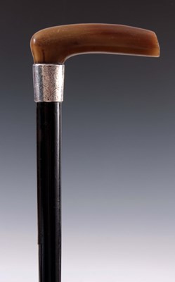 Lot 279 - A 19TH CENTURY EBONISED AND RHINO HORN WALKING...