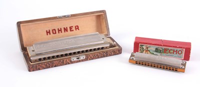 Lot 328 - A HOHNER 64 CHRONOMICA HARMONICA in original...