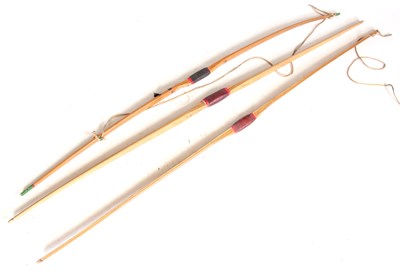 Lot 439 - THREE WOODEN LONGBOWS