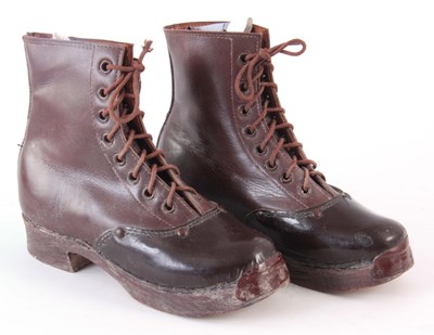 Lot 469 - A PAIR OF VINTAGE LEATHER WOODEN SOLED BOOTS...