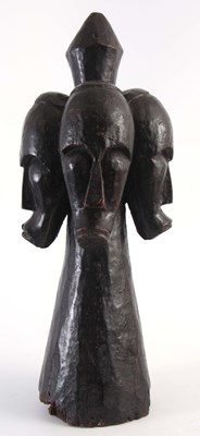 Lot 506 - AN ANTIQUE AFRICAN TRIBAL FOUR HEADED...