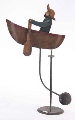 Lot 511 - A FOLK ART PAINTED STEEL AUTOMATON ROWING BOAT,...