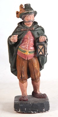 Lot 534 - A CARVED PAINTED FIGURE OF THE NIGHTS WATCHMAN...