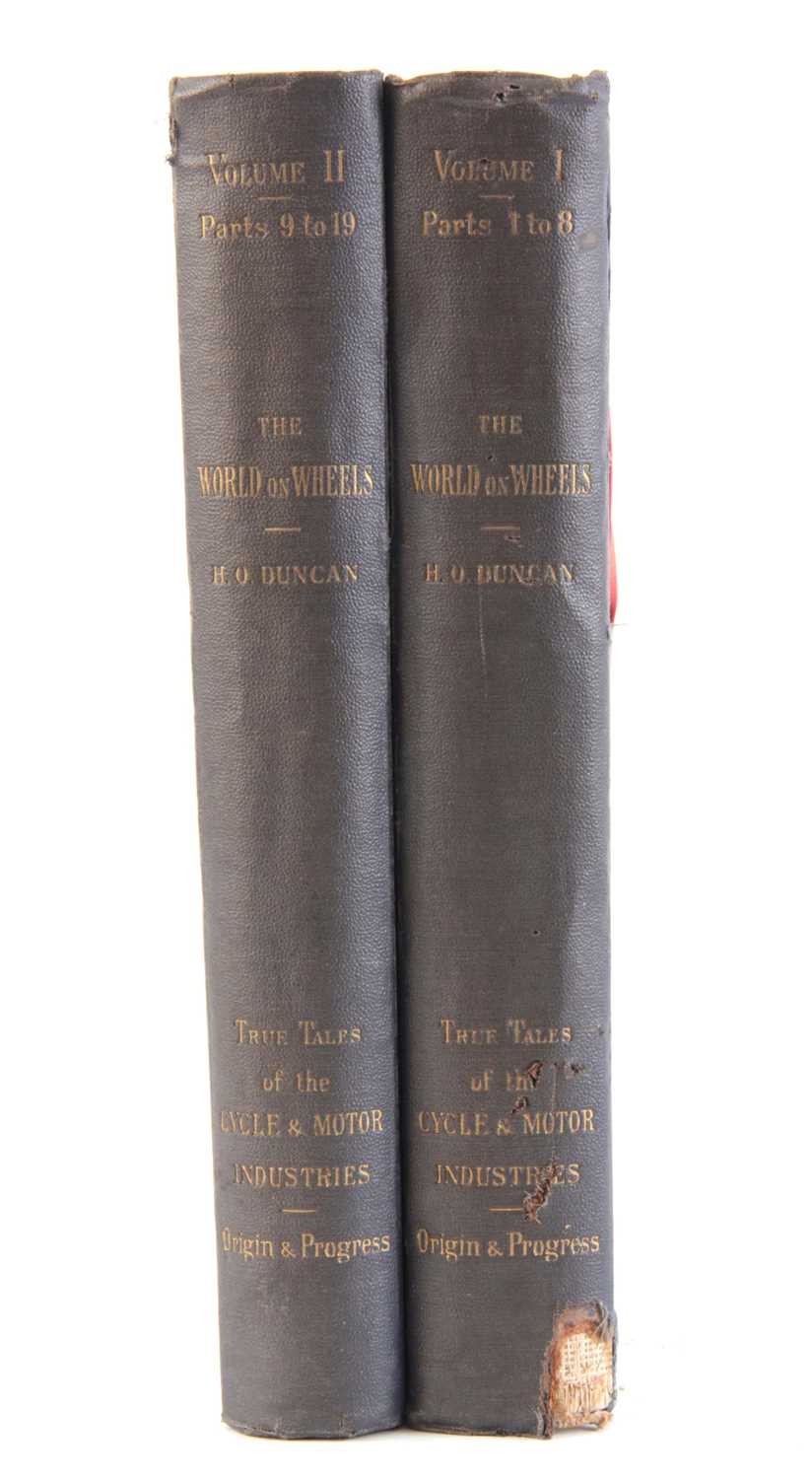 Lot 618 - A SET OF 2 VOLUMES OF THE WORLD ON WHEELS by H....
