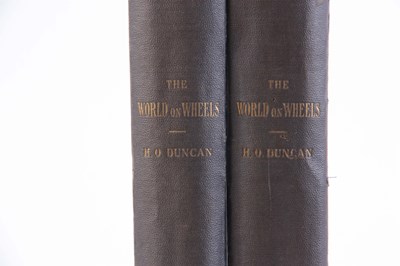 Lot 618 - A SET OF 2 VOLUMES OF THE WORLD ON WHEELS by H....