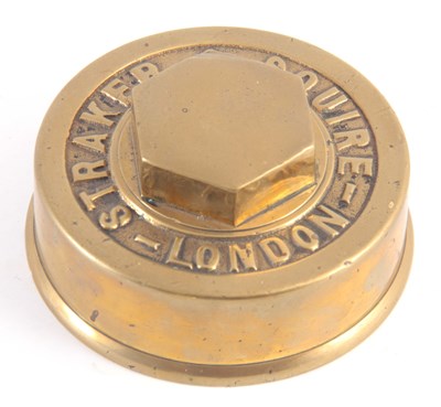 Lot 676 - A VINTAGE BRASS HUB CAP made by 'STRAKER &...
