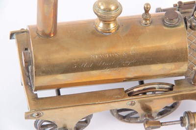 Lot 709 - A BRASS MODEL OF A STEAM ENGINE having been...