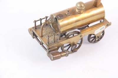 Lot 709 - A BRASS MODEL OF A STEAM ENGINE having been...