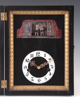 Lot 812 - AN UNUSUAL AUTOMATION WALL CLOCK with ebonized...