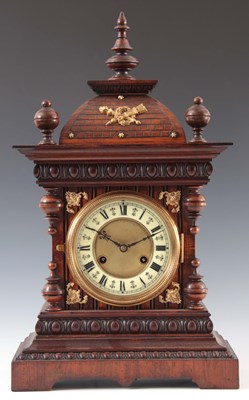 Lot 868 - A LATE 19th CENTURY GERMAN WALNUT CASED MANTEL...
