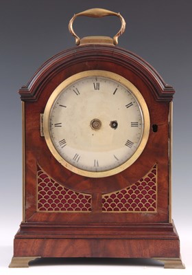 Lot 930 - A SMALL REGENCY FIGURED MAHOGANY BRACKET CLOCK...