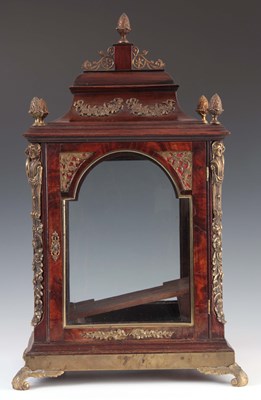 Lot 935 - A GEORGE III FIGURED MAHOGANY AND ORMOLU...