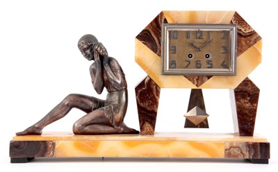 Lot 960 - A LARGE ART DECO FIGURAL MARBLE CLOCK SIGNED...